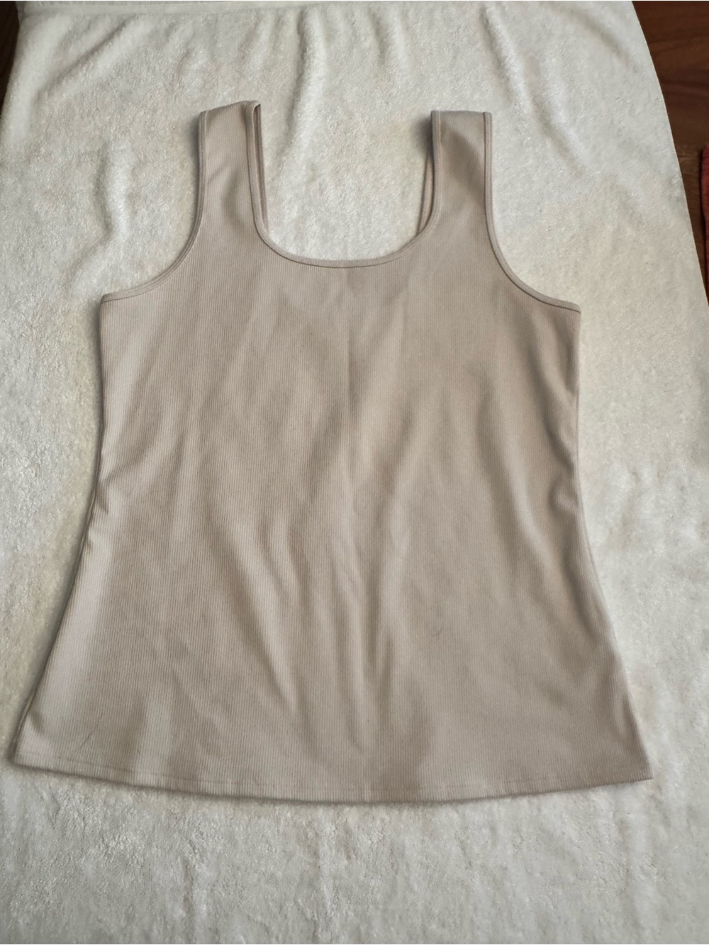 Zella Ribbed Scoop Tank in Light Taupe. Scoop is deeper in back.